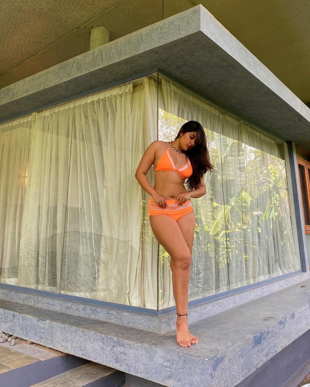 Buy swimwear for women at a store.