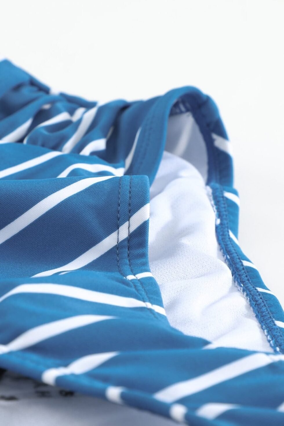 Buy swimwear for women at a store.