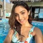 Buy swimwear for women at a store.