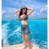 Buy swimwear for women at a store.