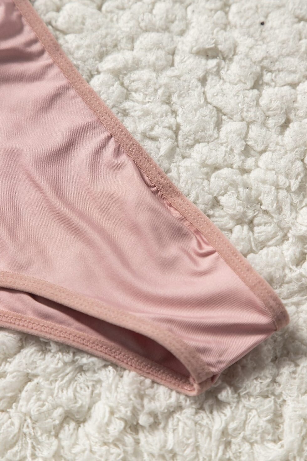 Buy swimwear for women at a store.