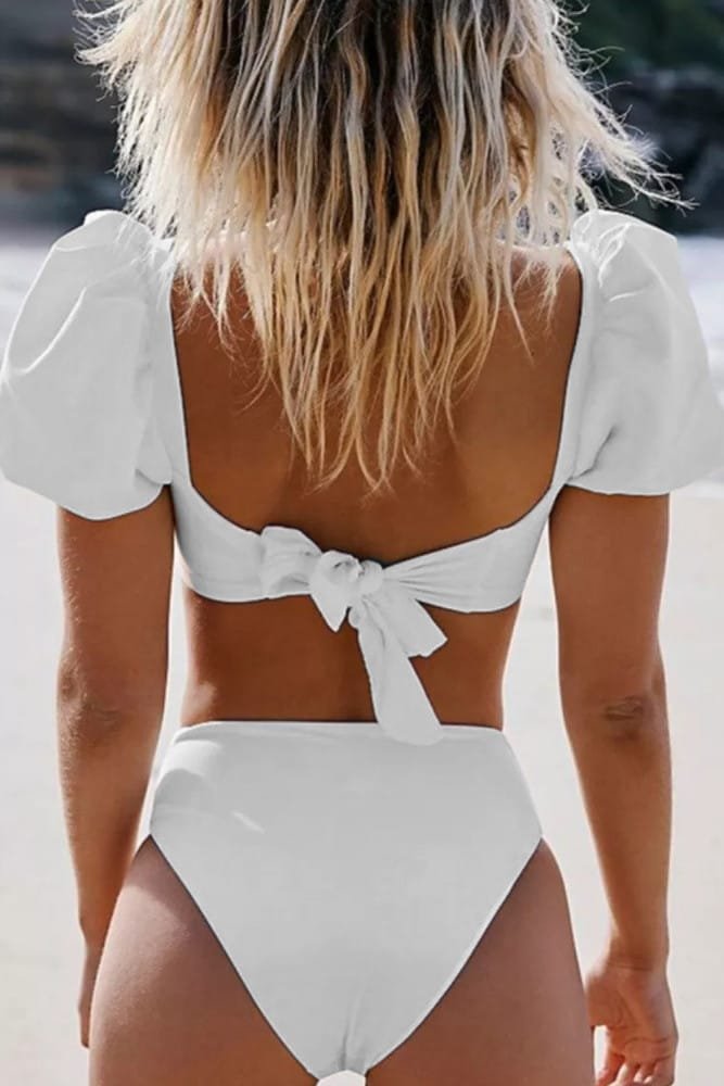 Buy swimwear for women at a store.