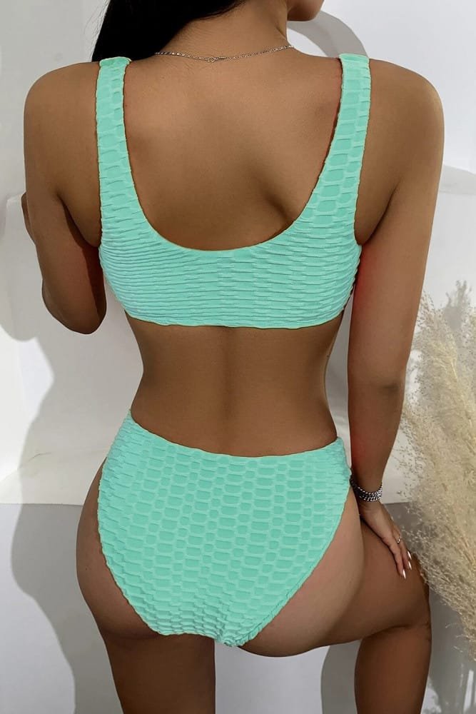 Buy swimwear for women at a store.